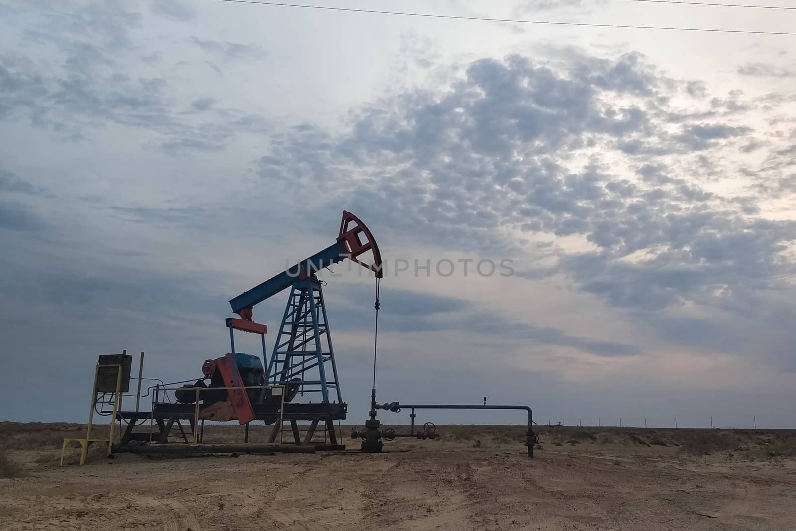 rocking machine on an oil well. Oil production. by DePo