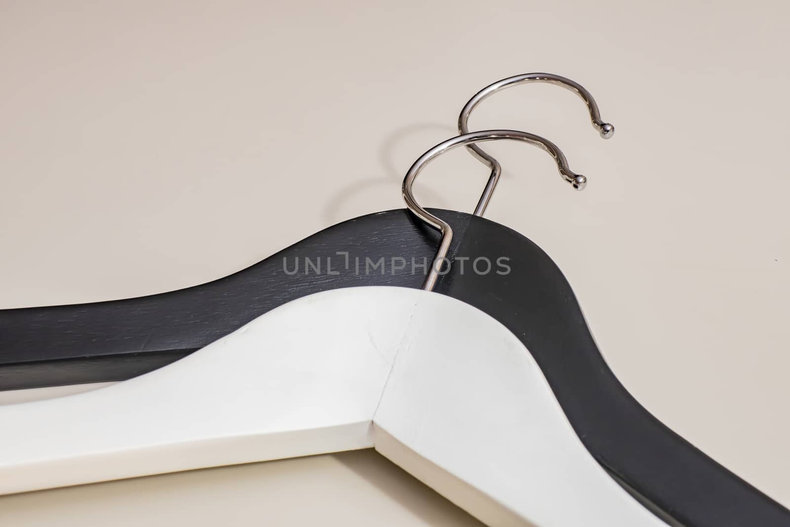 black and white wooden hangers