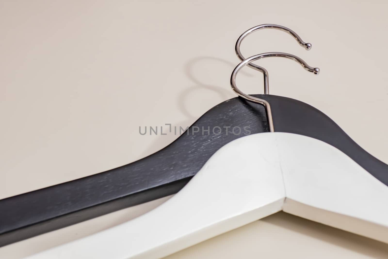black and white wooden hangers
