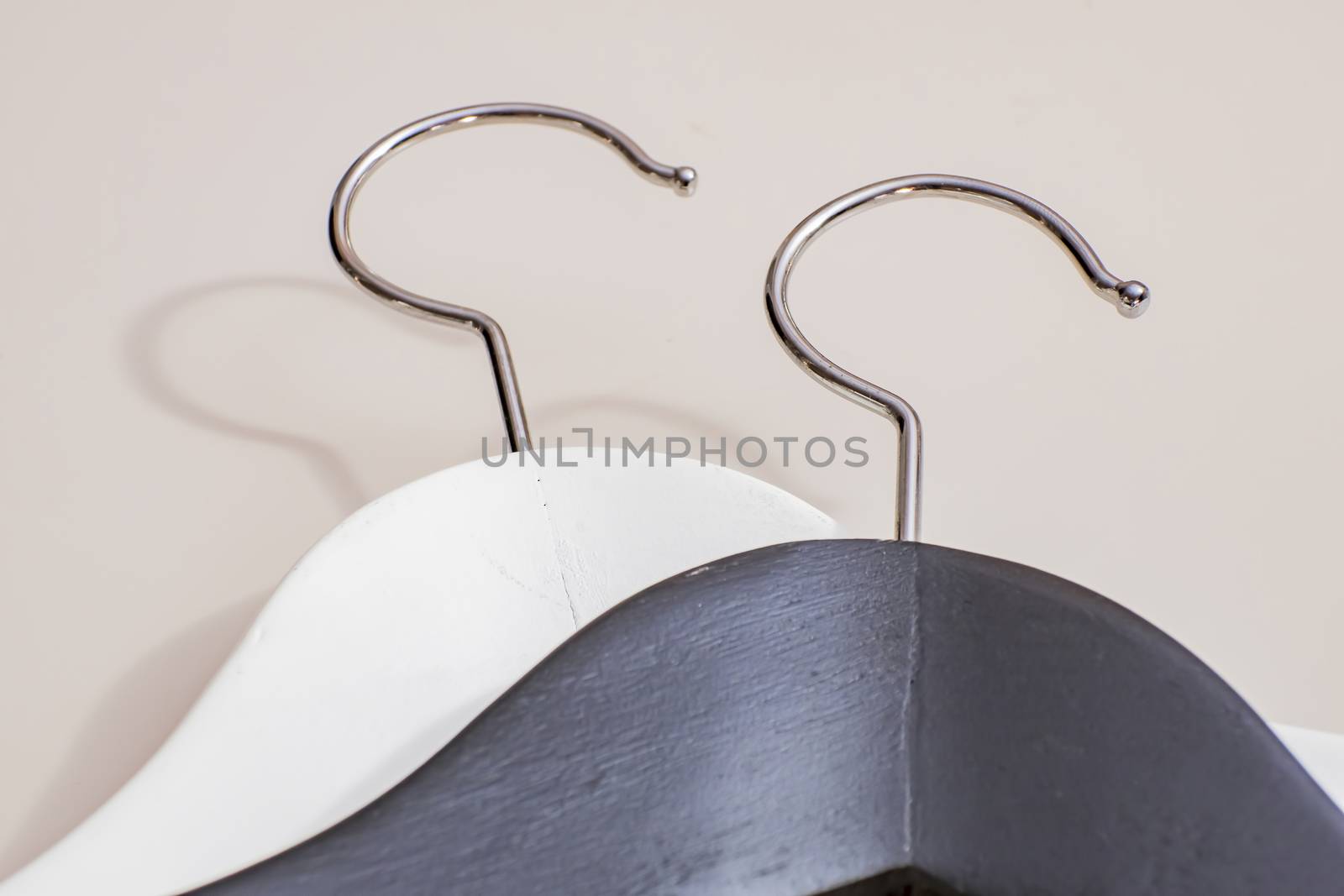 black and white wooden hangers
