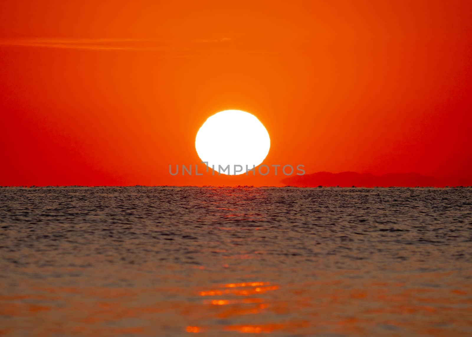 big sun down over sea sunrise, red sky