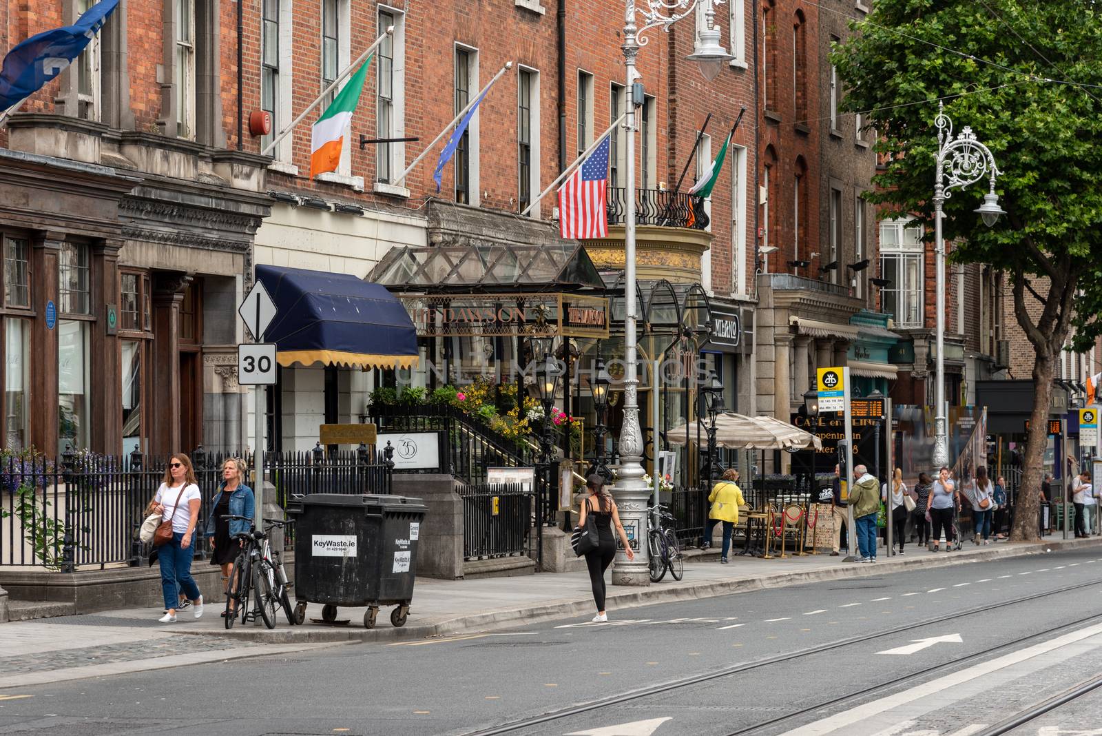 Dublin, Ireland--July 16, 2018. A busy commercial street with hotels, restaurants and shopping.