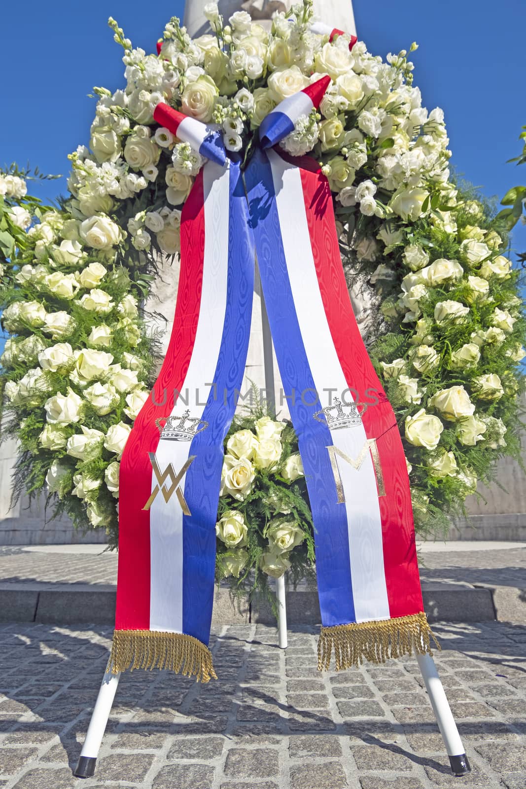 Amsterdam, Netherlands - May 5, 2020: Wreath from King Willem Alexander and Queen Maxima from the Netherlands at the National Monument on occasion of remembrance of the worldwar II  in Amsterdam the Netherlands 