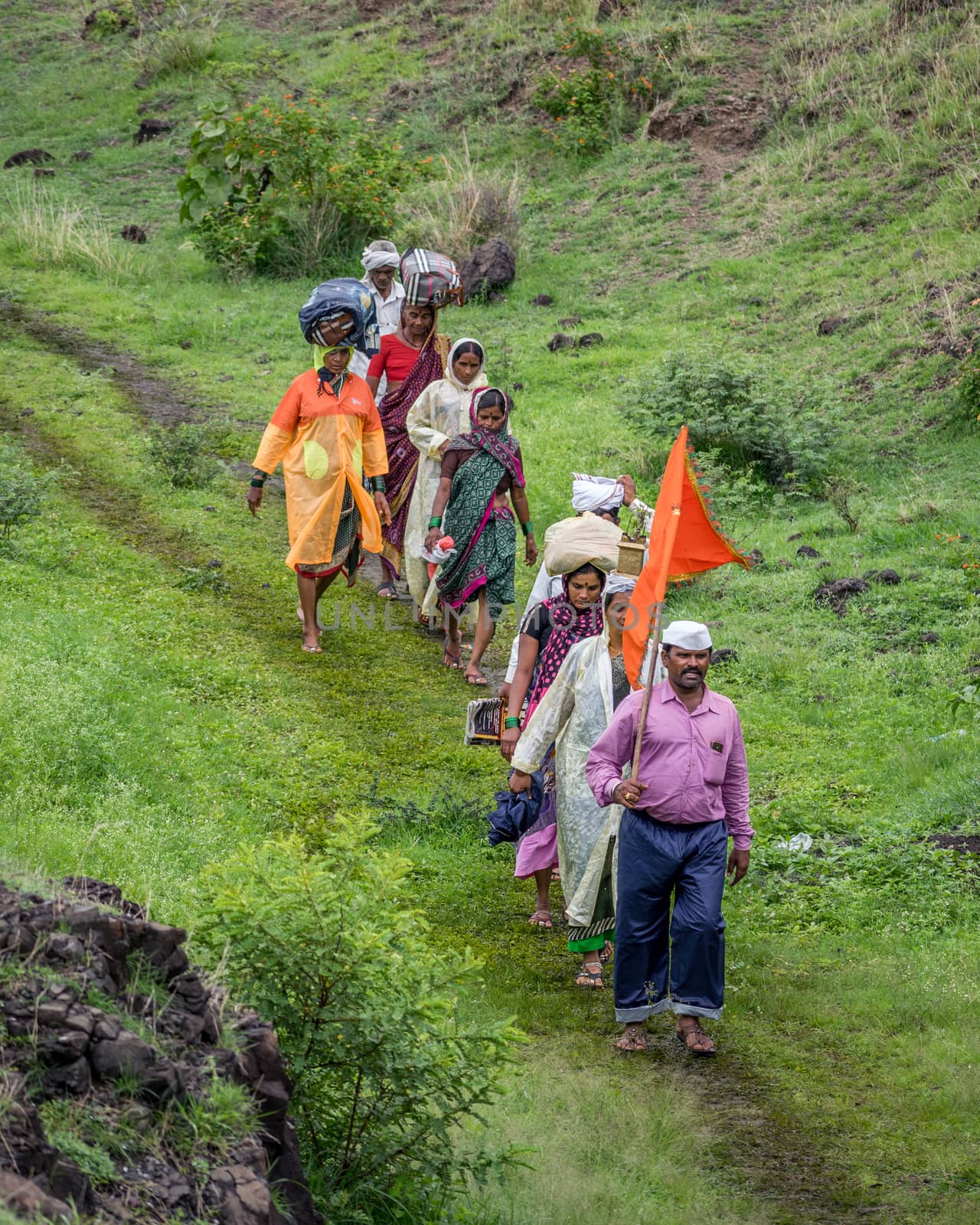 Daundaj, Maharashtra, India - July 12, 2018 : Pilgrims also know as `Varkari` on devotional walk to the holy place of Pandharpur.