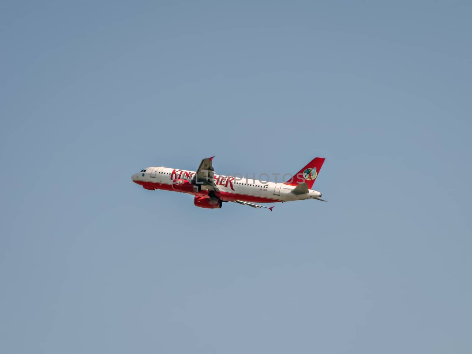 Close up image of  Kingfisher Airlines airbus A-320 # VT-DKR takes off from Leh IXL. Clear image with blue sky background.