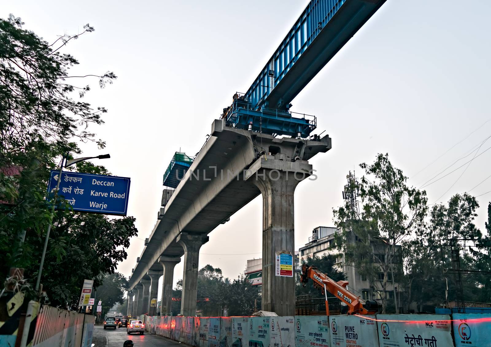 Pune, India  metro work in progress on the backdrop of beautiful early morning sky.