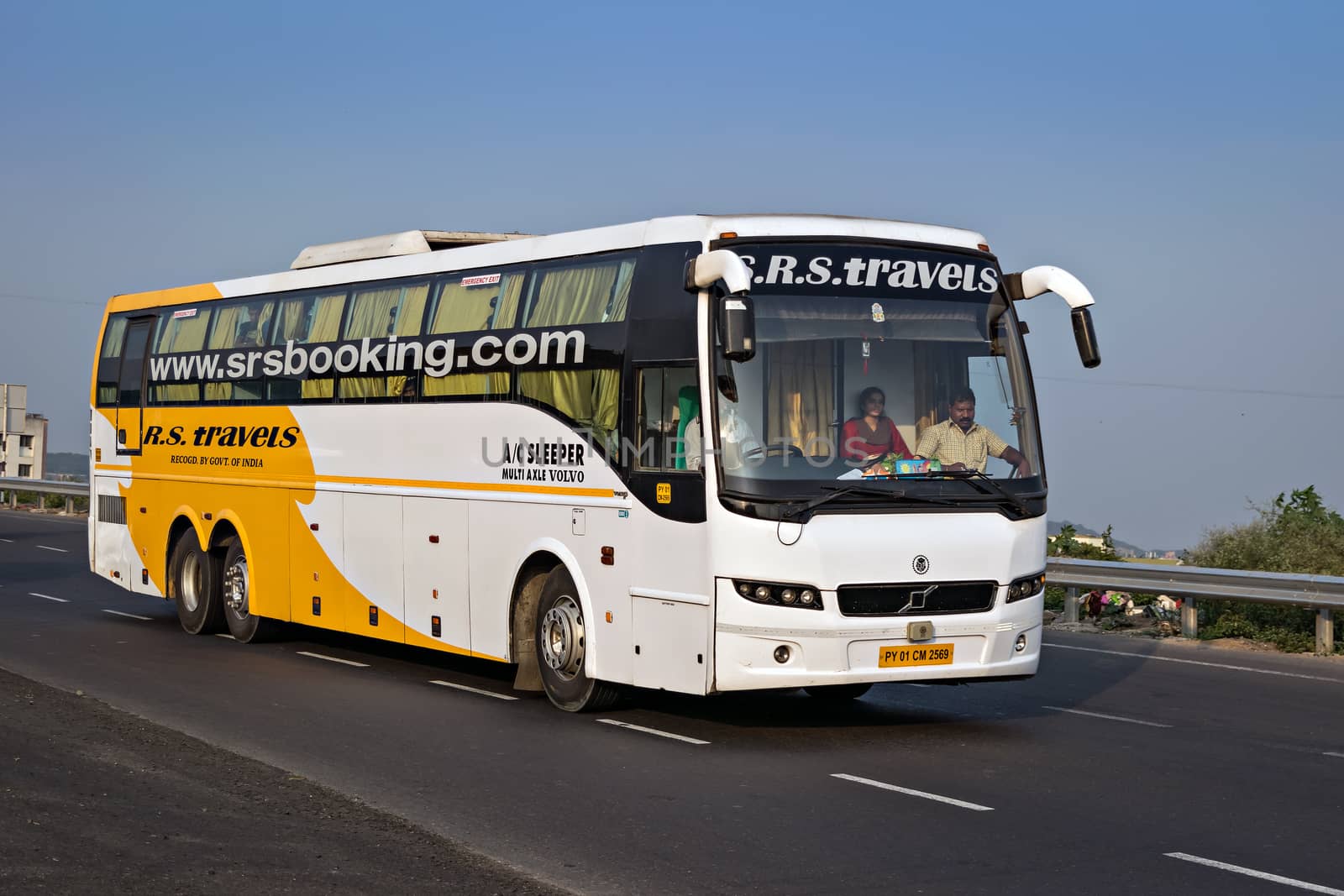 Pune, Maharashtra, India- October 25th, 2016: SRS travels multi axle volvo B9R bus speeding on highway.