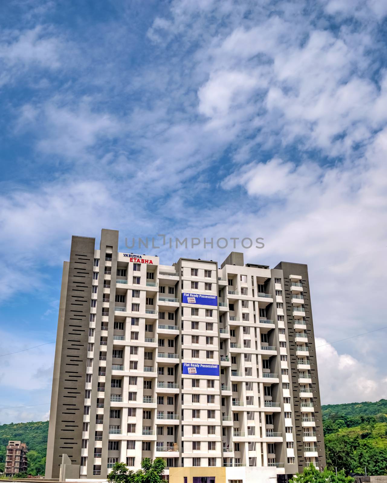 Pune, Maharashtra, India - September 14th, 2017 : High-rise building in a fast  developing city. by lalam