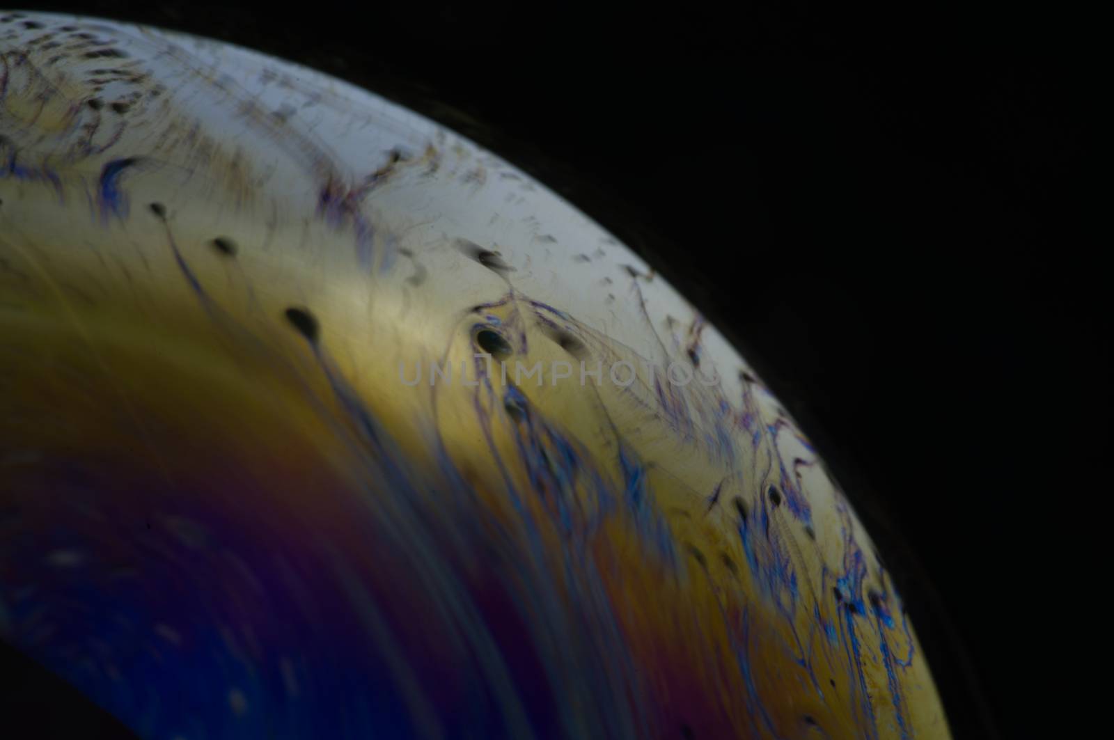 Structure texture soap bubble abstract black background. by noppha80
