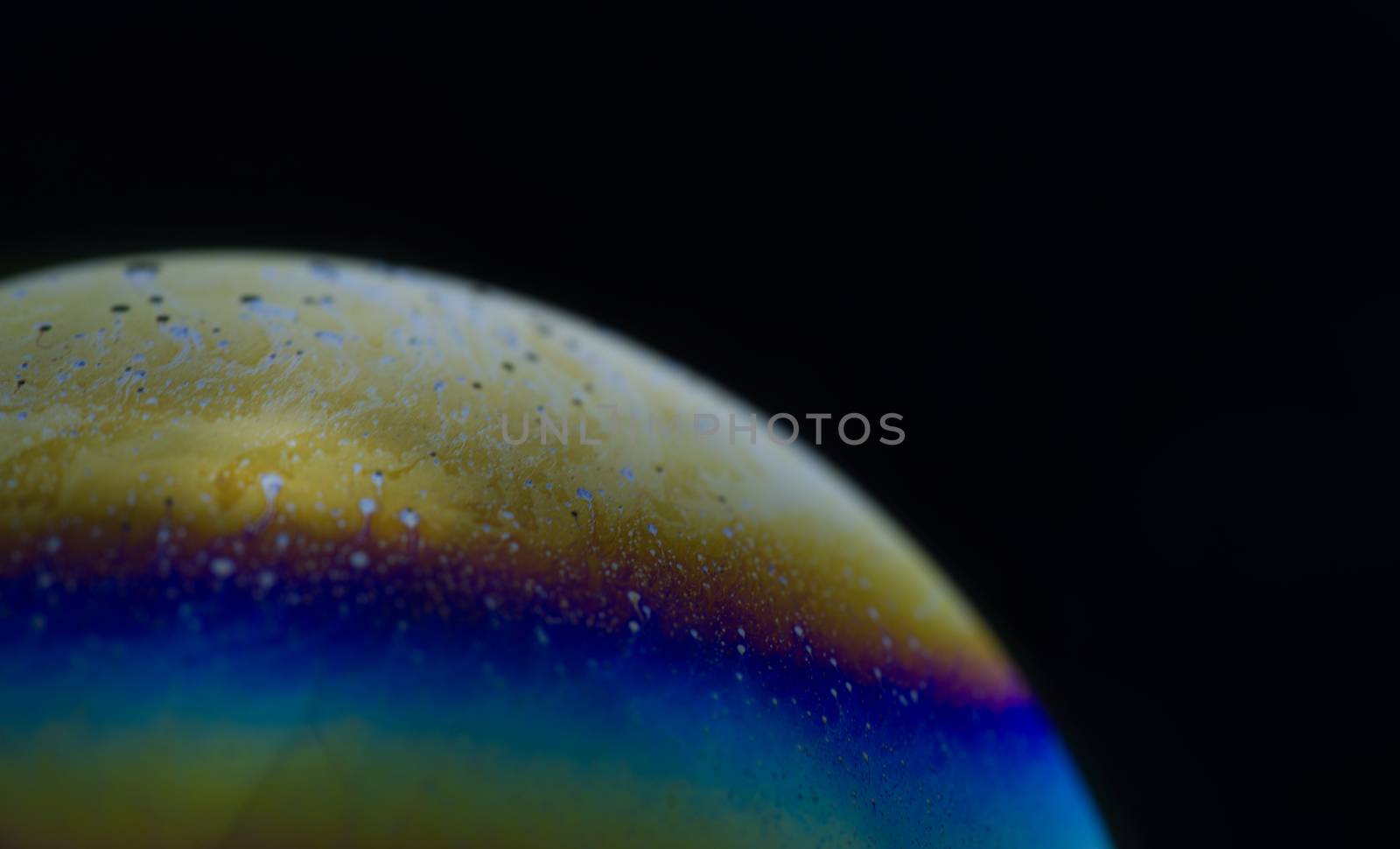 Structure texture soap bubble abstract black background. by noppha80