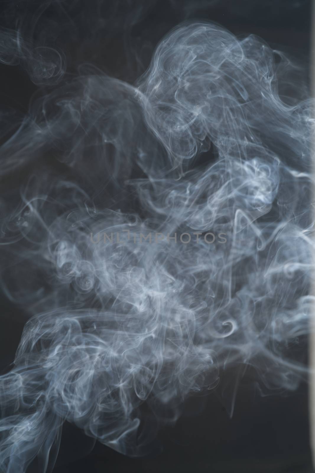 White smoke, curly black background, used as the background imag by noppha80