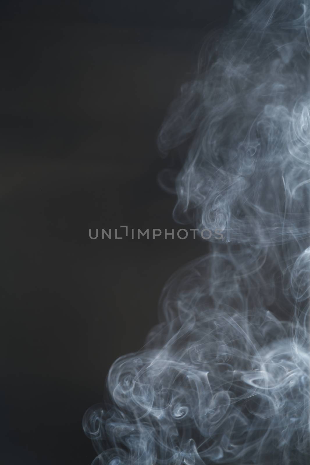 White smoke, curly black background, used as the background imag by noppha80