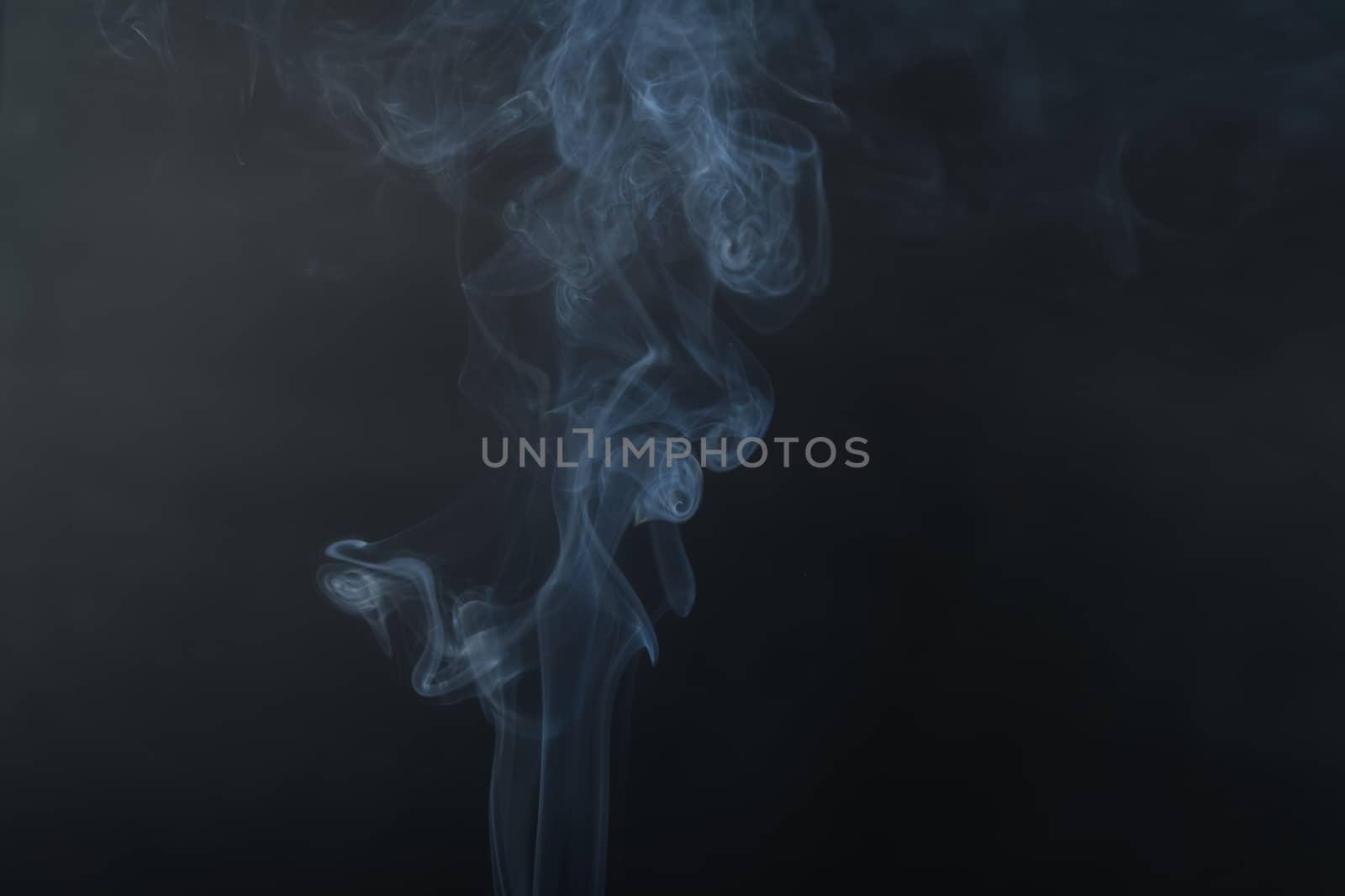 White smoke, black background, used as the background image. by noppha80