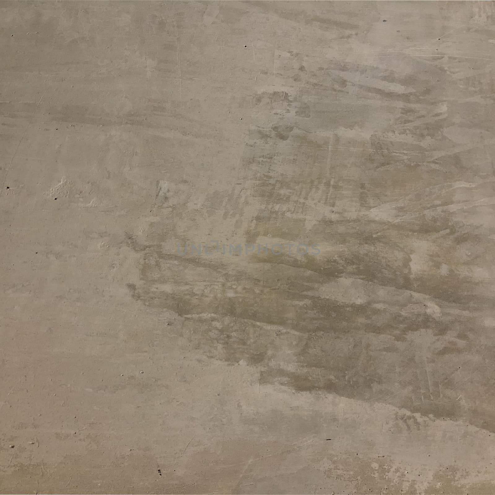 The gray cement background wall has a pattern made of cement plaster.