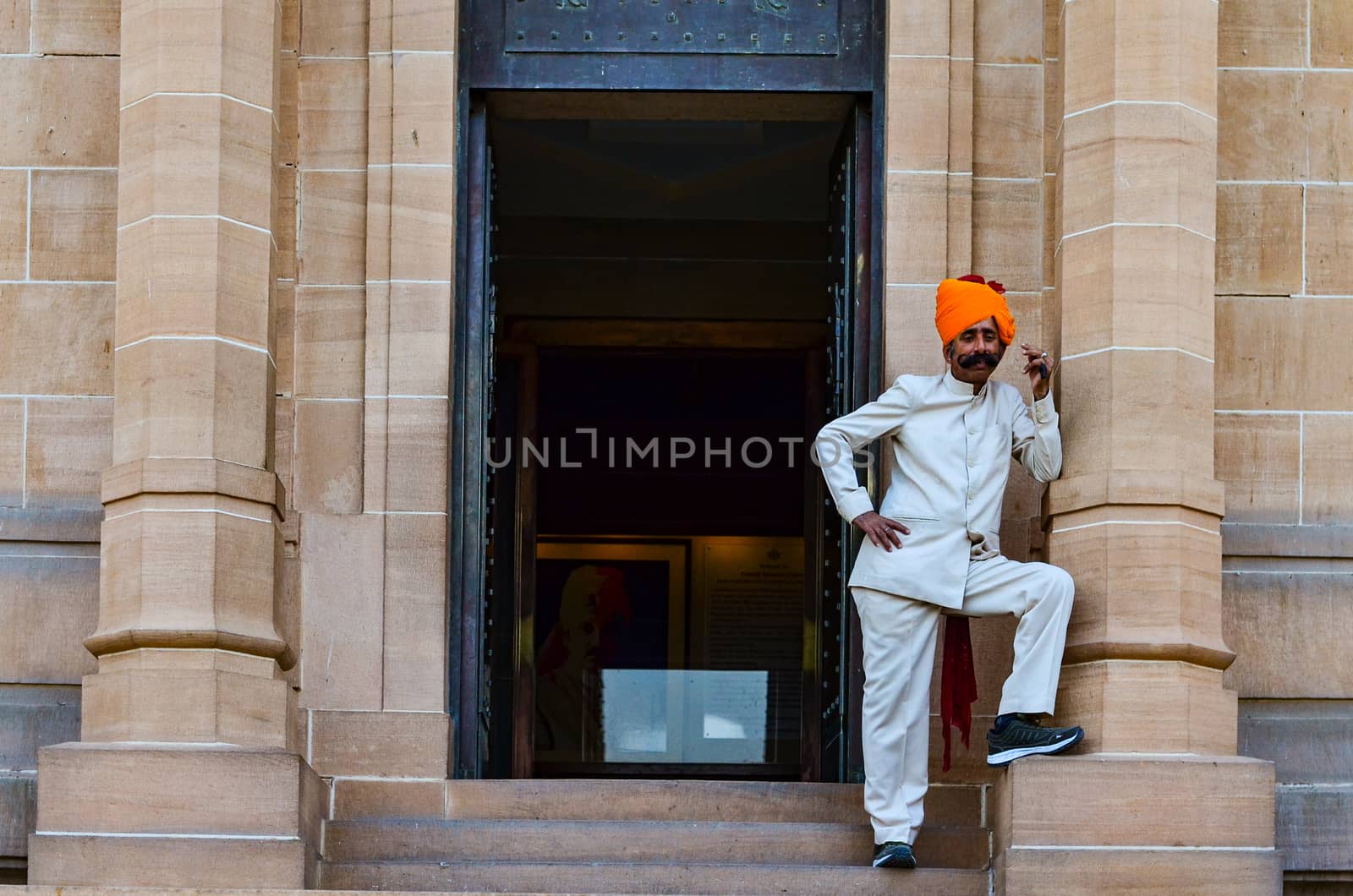 Jodhpur, Rajasthan, India, 2020. Guard with imposing mustache in front of a gate in Umaid Bhawan.