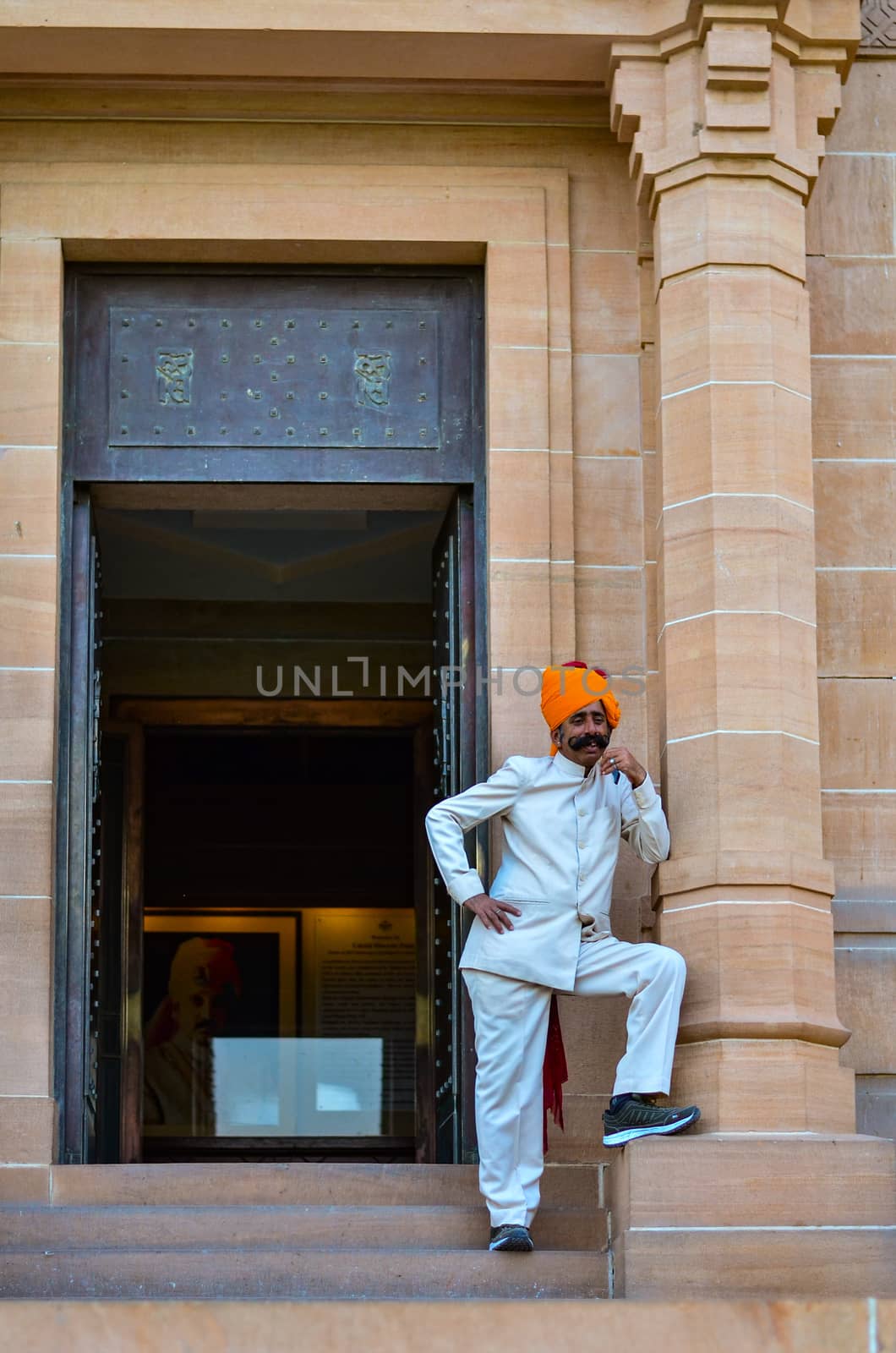 Jodhpur, Rajasthan, India, 2020. Guard with imposing mustache in front of a gate in Umaid Bhawan. by jayantbahel