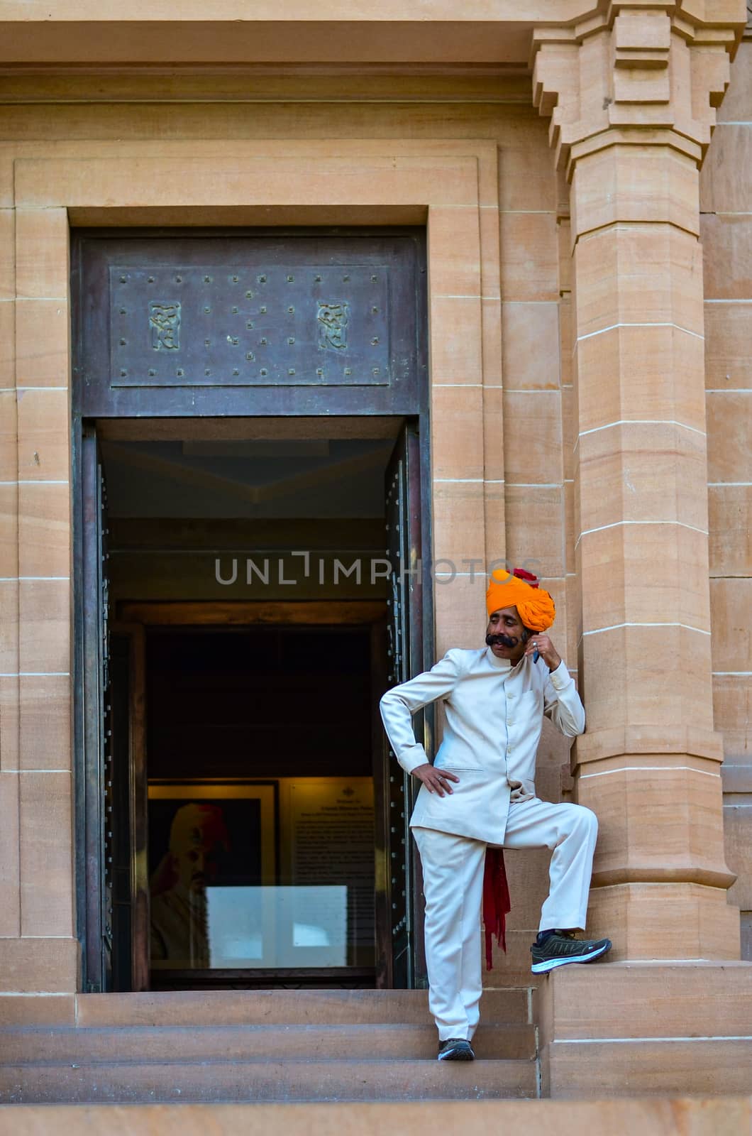 Jodhpur, Rajasthan, India, 2020. Guard with imposing mustache in front of a gate in Umaid Bhawan.