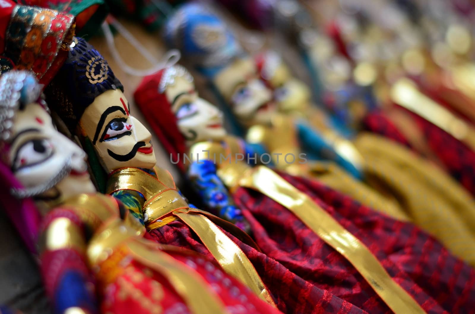 Rajasthani puppets (Kathputli) on display at shop in Mehrangarh Fort in Jodhpur. Kathputli is a string puppet theatre, native to Rajasthan, India, and is the most popular form of Indian puppetry. by jayantbahel