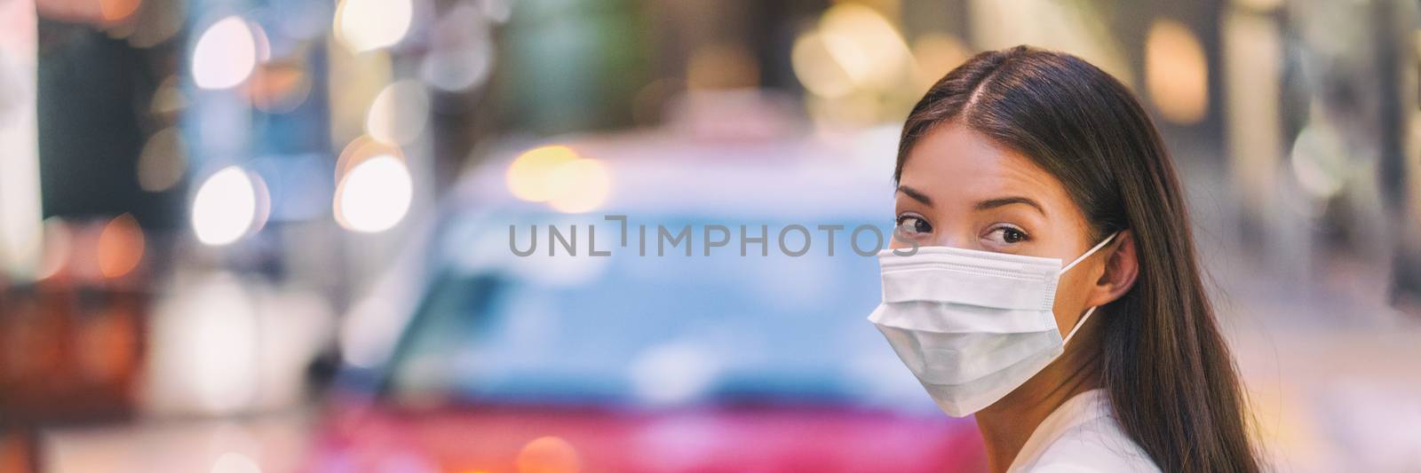 Flu virus protection mask protective against influenza sickness viruses and disease. Sick sian woman wearing surgical face mask in public spaces. Healthcare banner panorama concept.