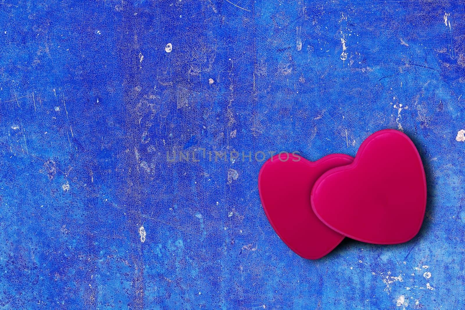 Red heart on blue vintage background with copy space, love, valentine and wedding concept