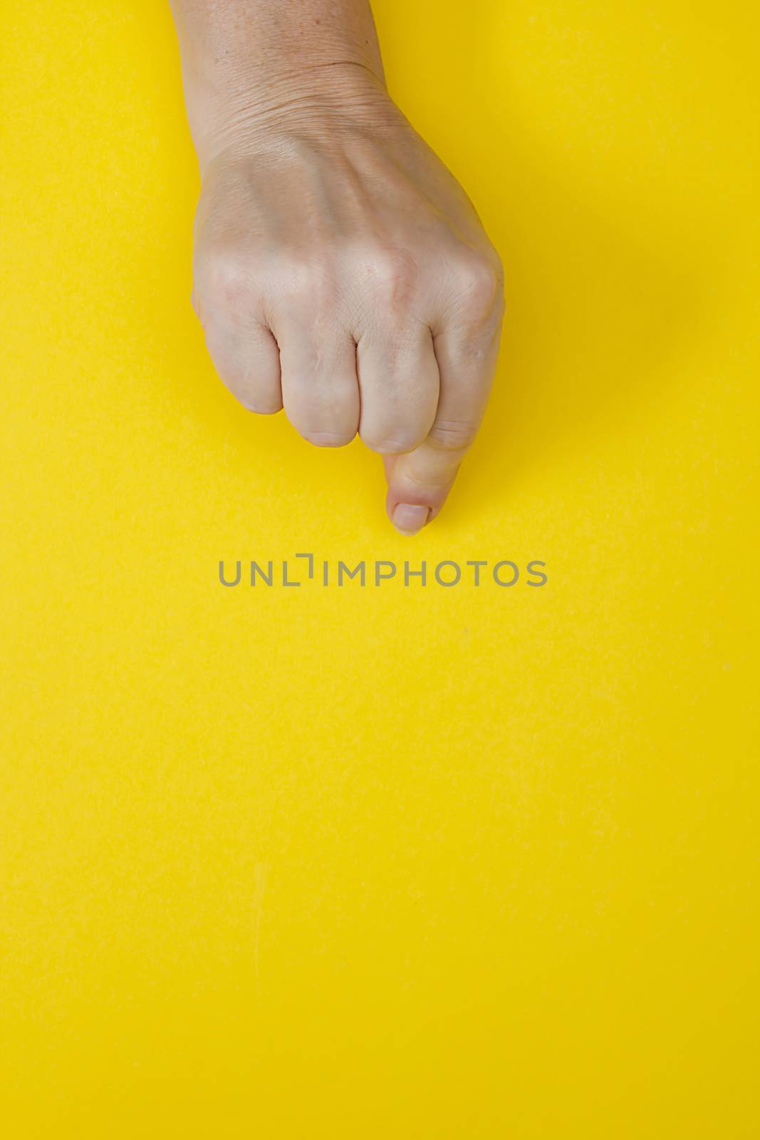 Hand with clenched fingers in a pinch by VIPDesignUSA