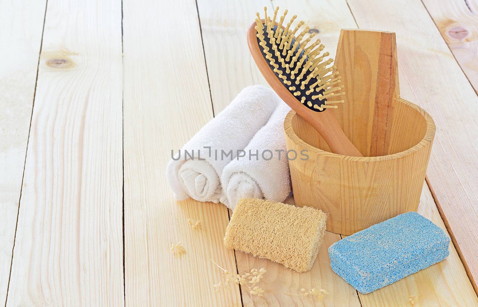 Spa equipment set on wood table, treatment concept