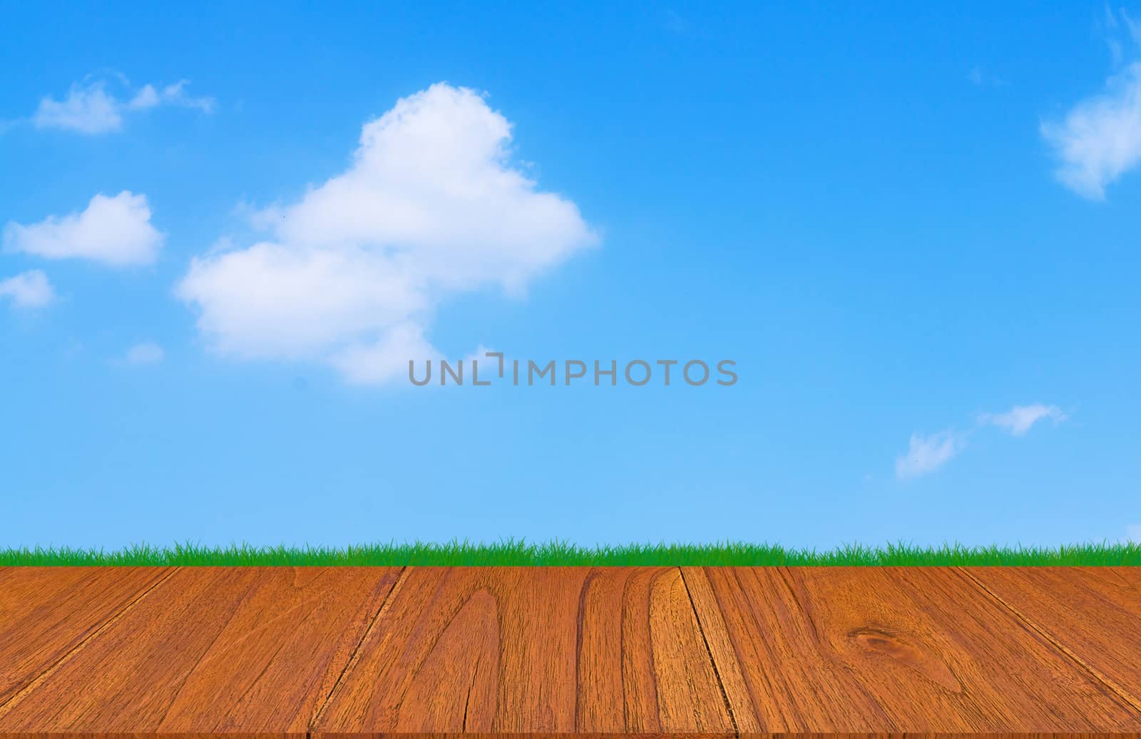 Wood table on blue sky background, montage or display product concept