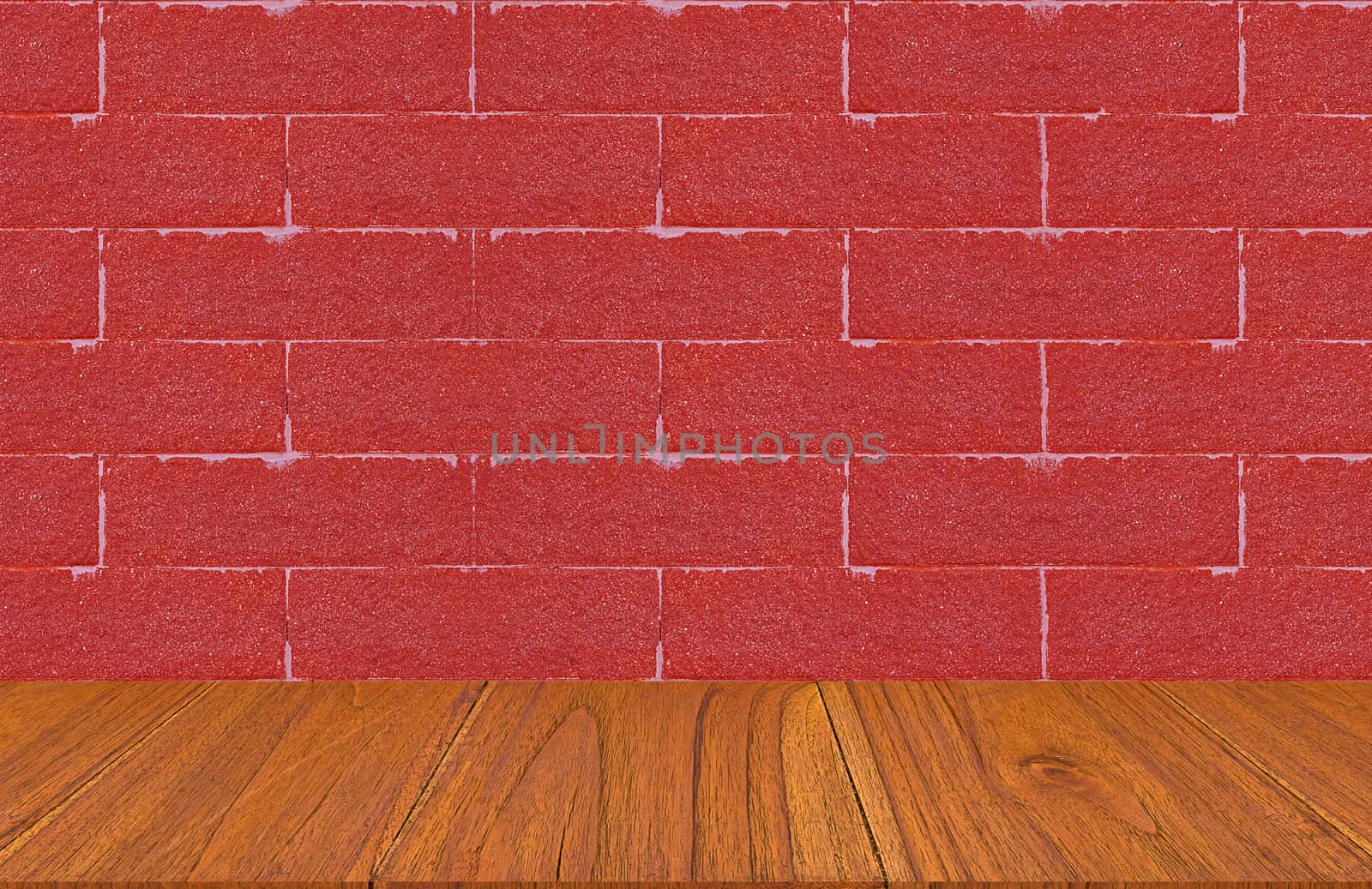 Wood table on red brick wall background, montage or display product concept