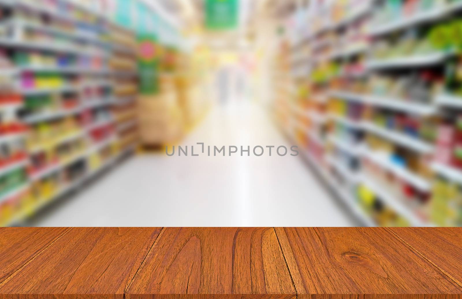 Wood table on food product shelf in supermarket, montage or display product concept