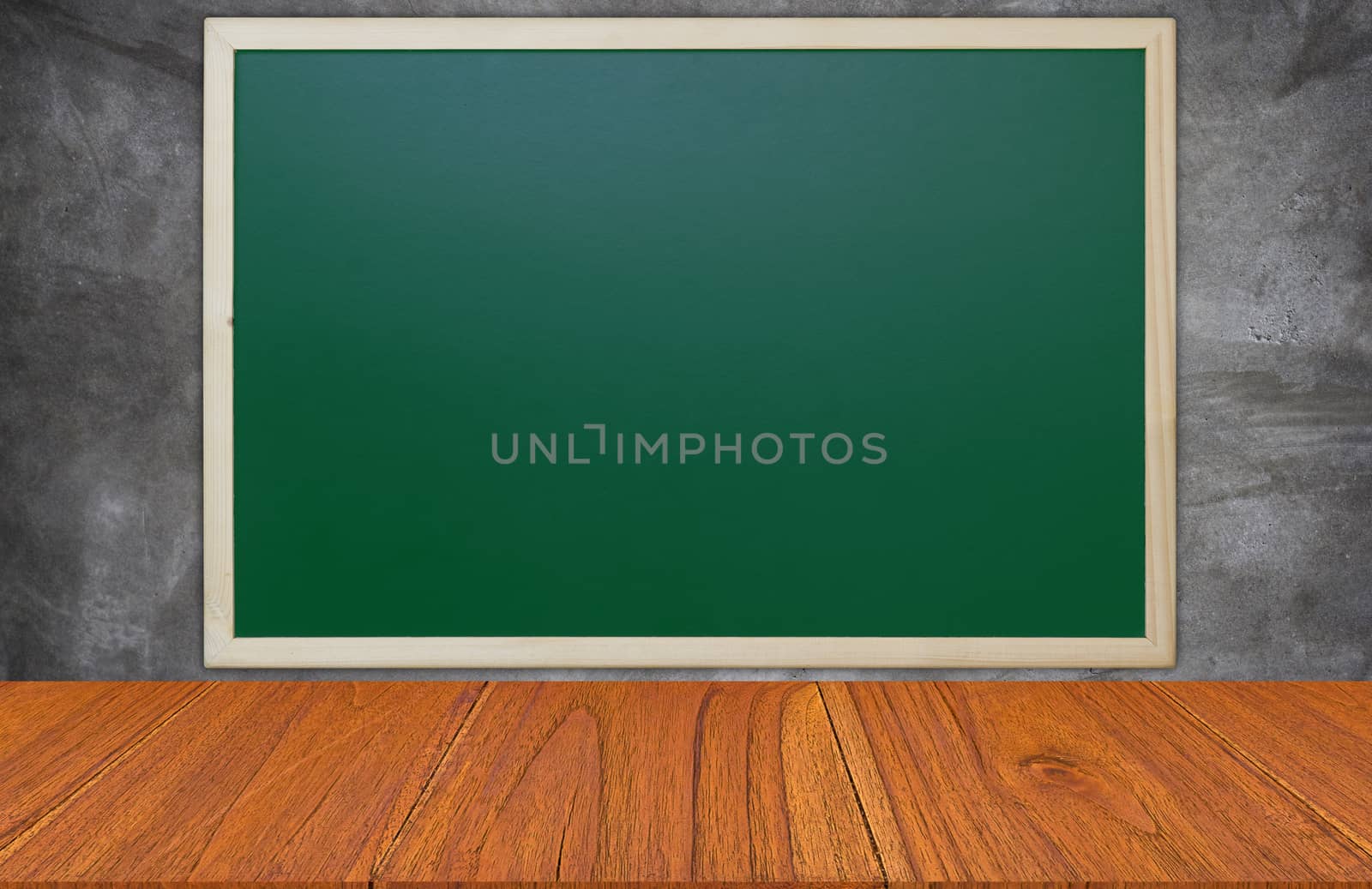Wood table on blackboard background, montage or display product, education concept