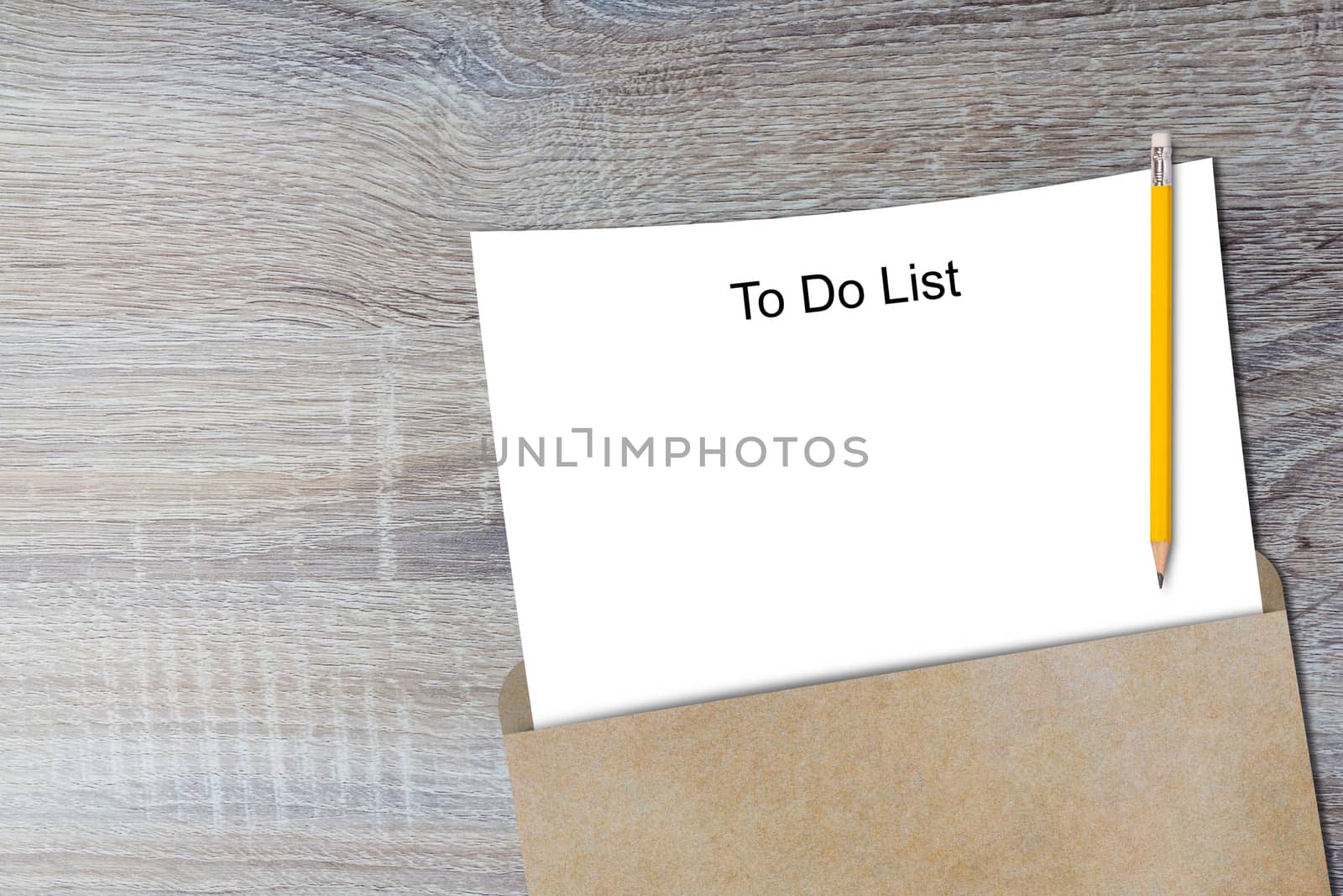 To do list concept, white paper and yellow pencil on wood background