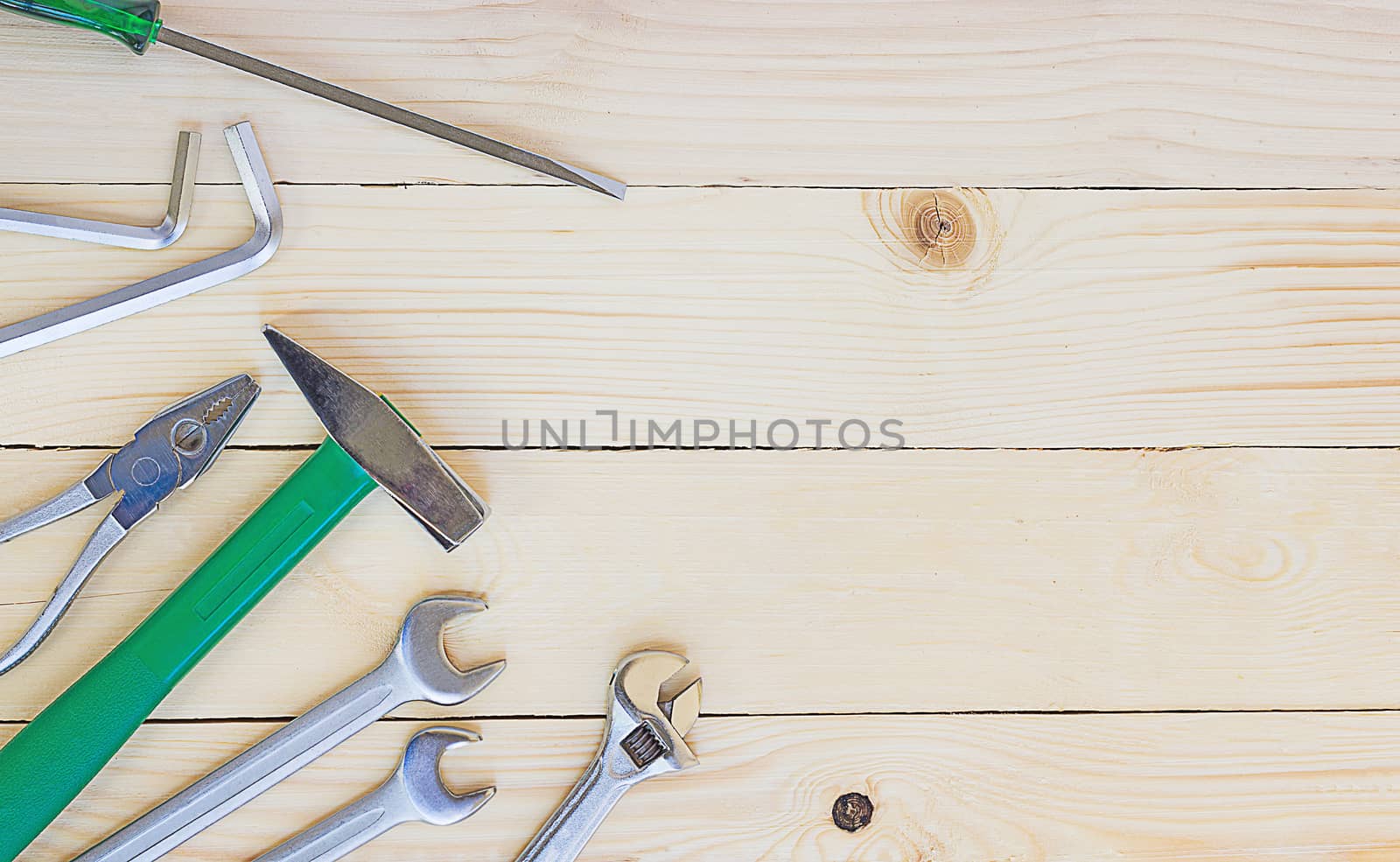 Tool set on wood background, top view, equipment concept