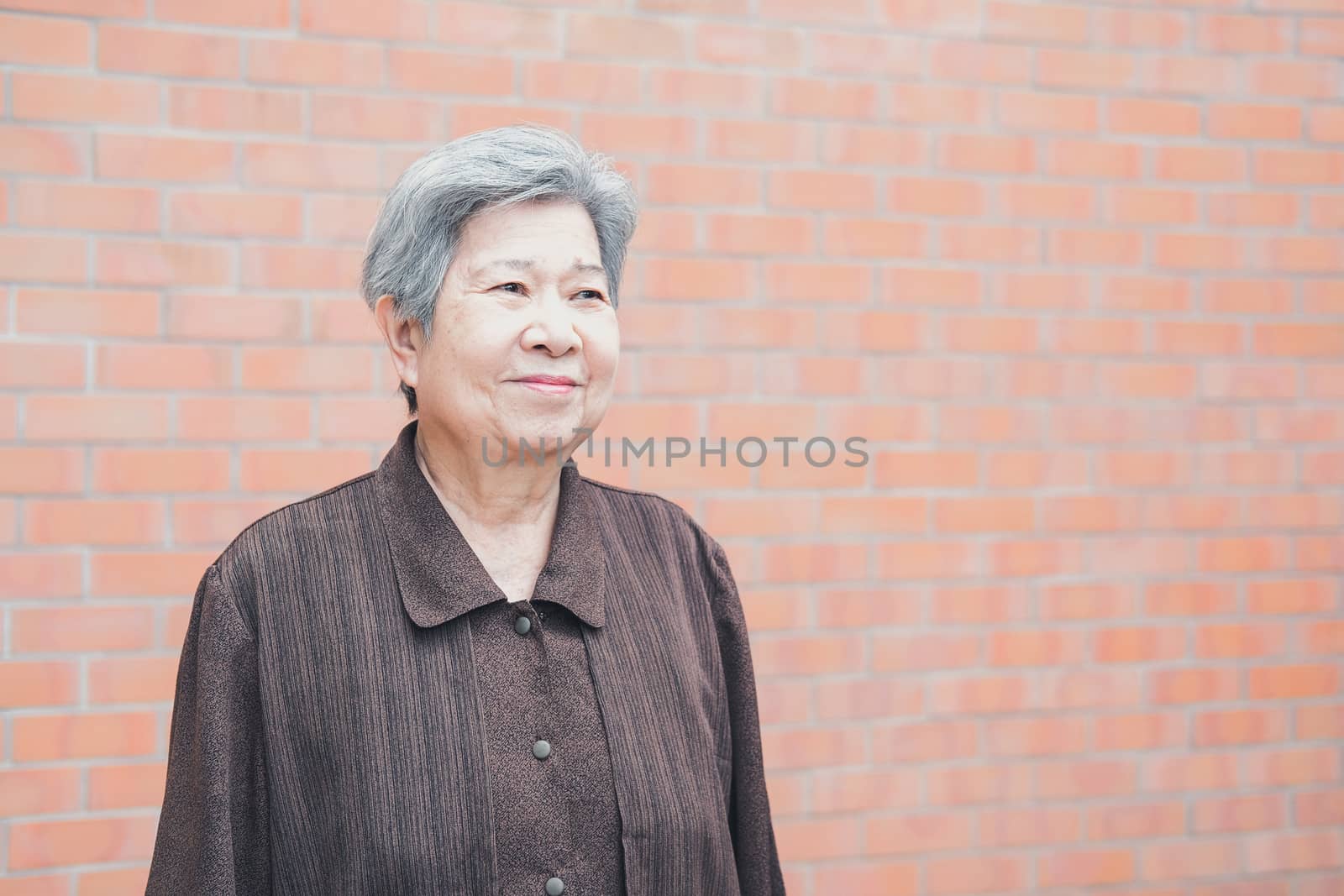asian elder female woman resting relaxing at home. elderly senior leisure lifestyle