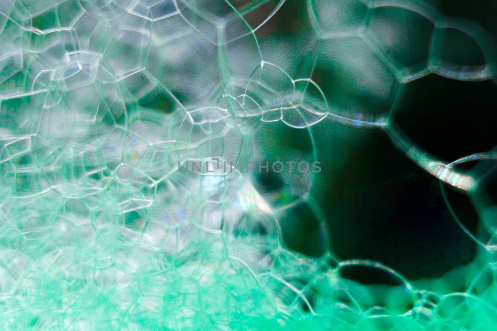 Abstract macro clean green foam shot background of soap bubbles by robbyfontanesi