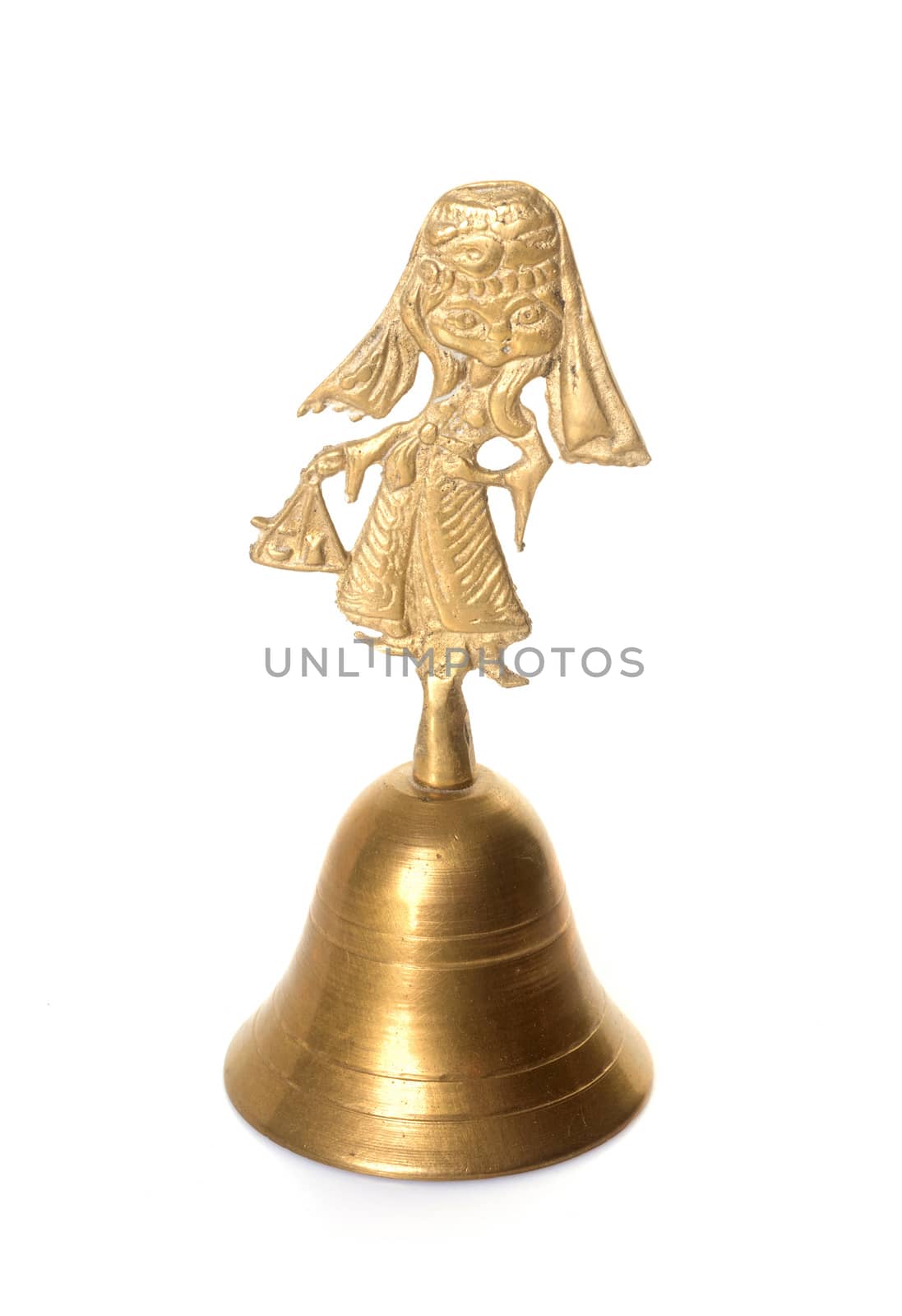 brass trinket in front of white background
