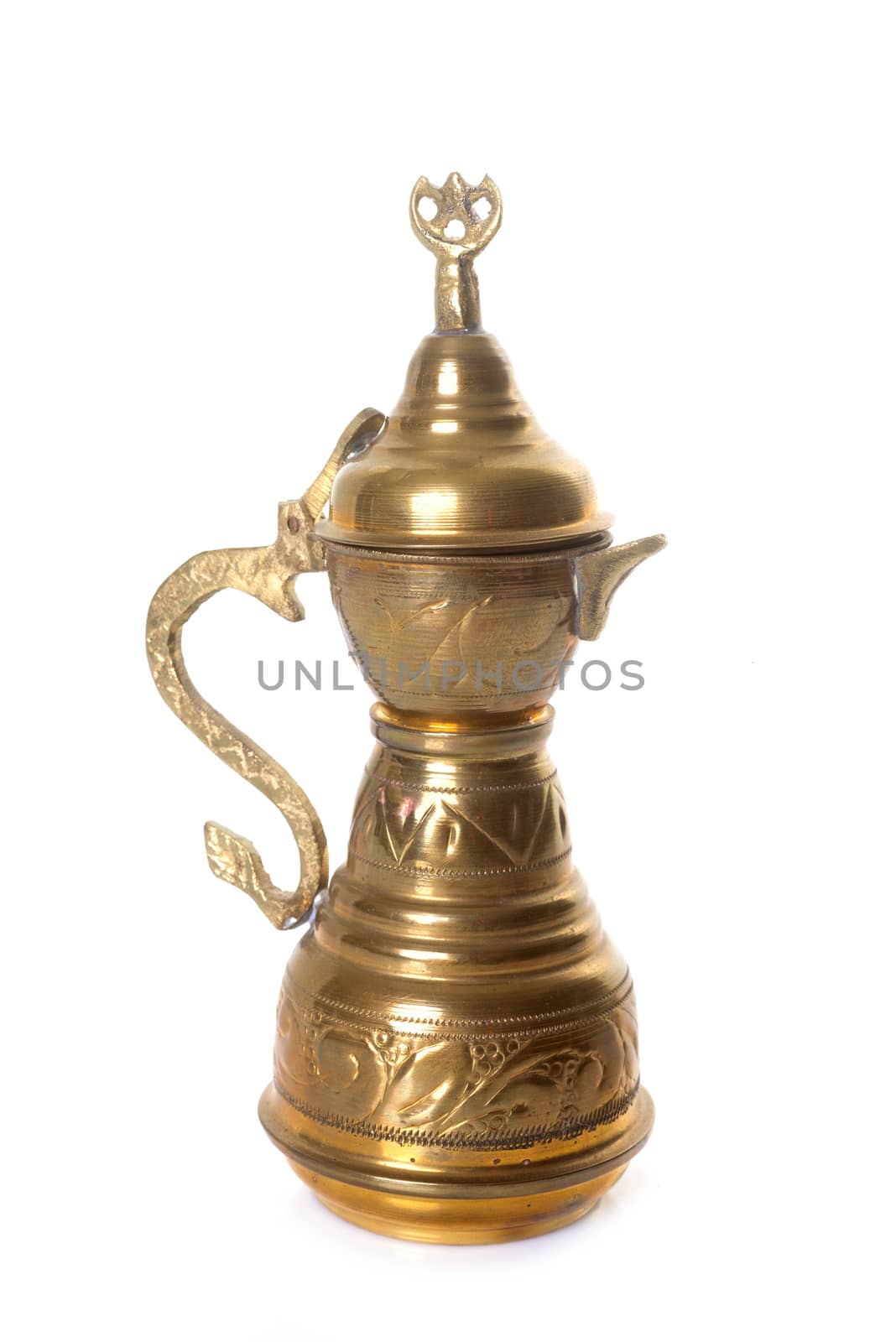 brass teapot in studio by cynoclub