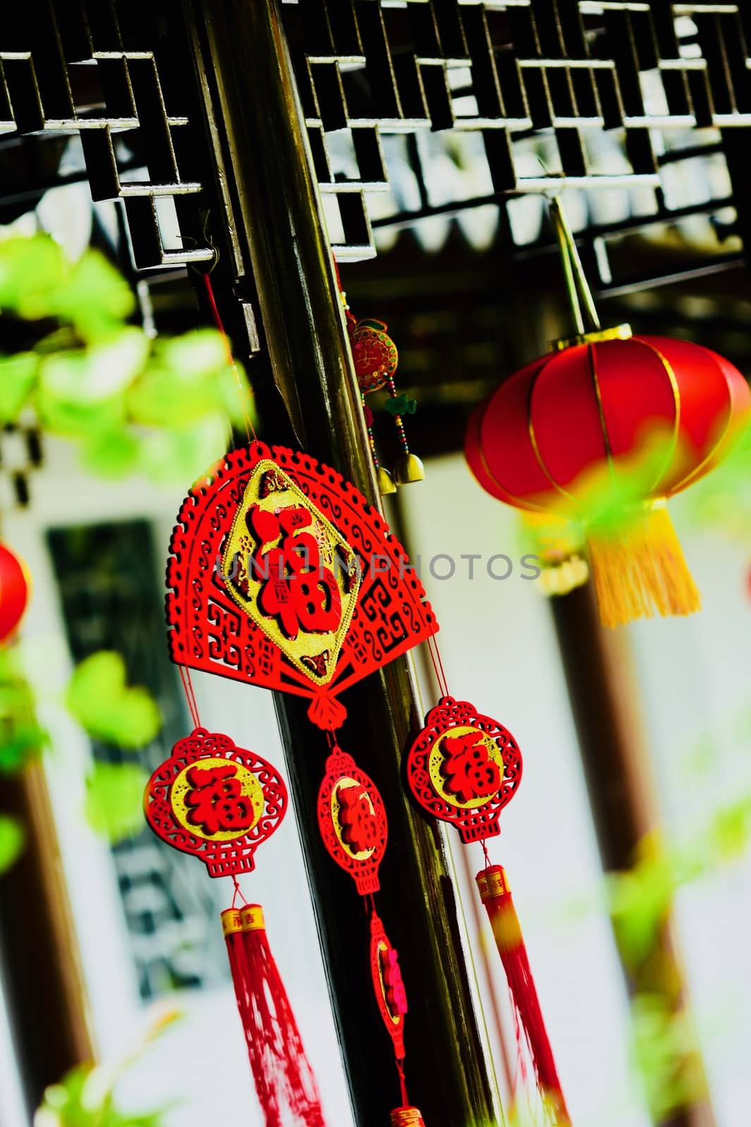 Chinese New Year decorations involving the red colour and lucky images to Drive Off Bad Luck. by Marshalkina