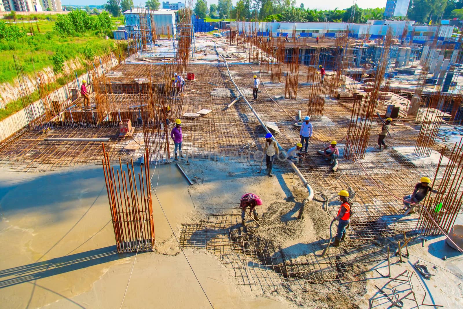 Guwahati, India - june 2019 : labor is working on a new constructing buildings in guwahati