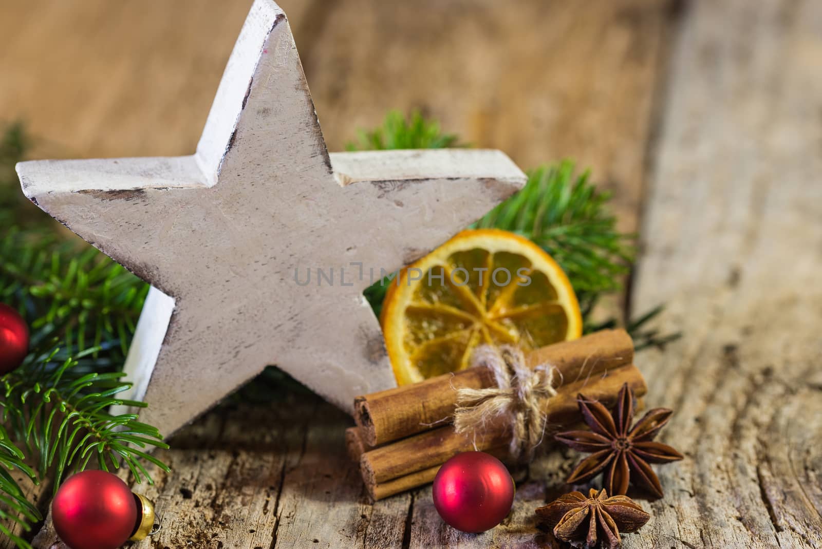 Christmas composition with white wooden star shape and ornaments