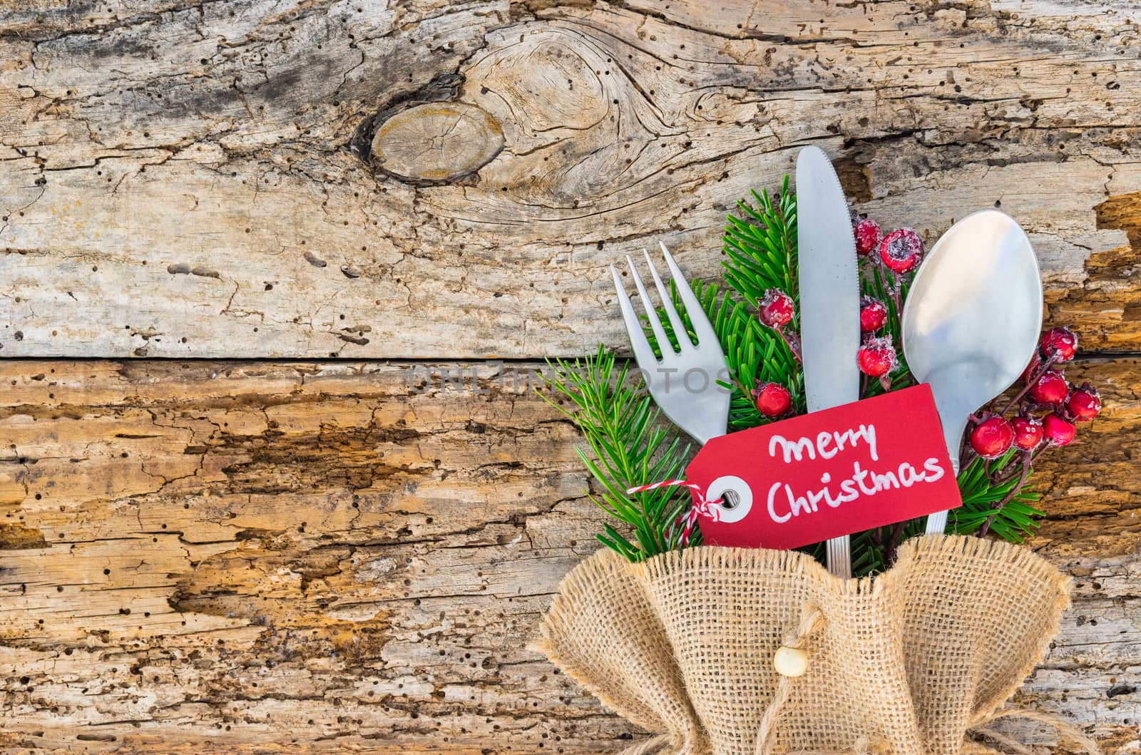 Christmas dinner cutlery for holiday top view. Empty space for text