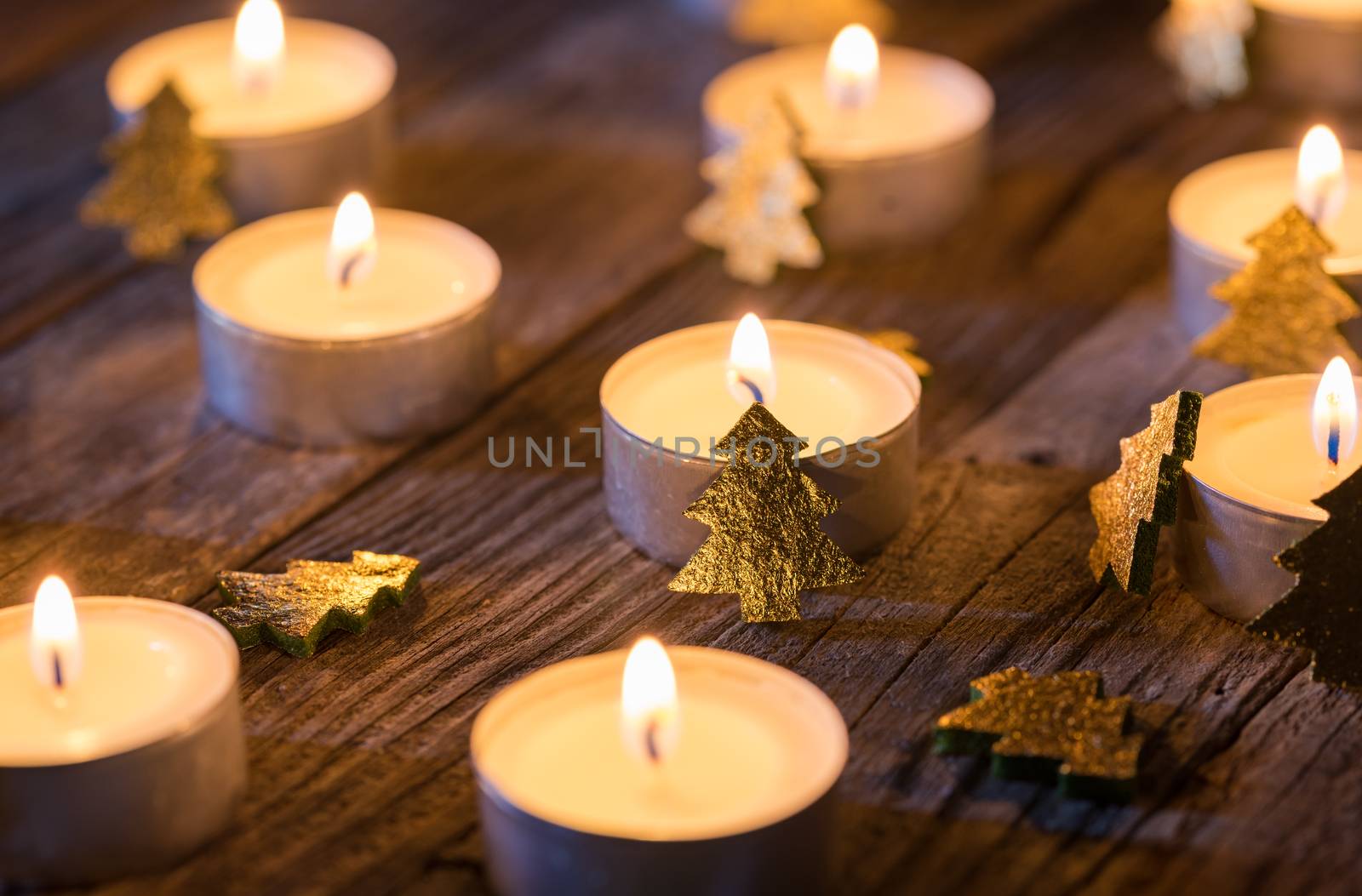 Advent candles light, Christmas candles burning at night by Vulcano