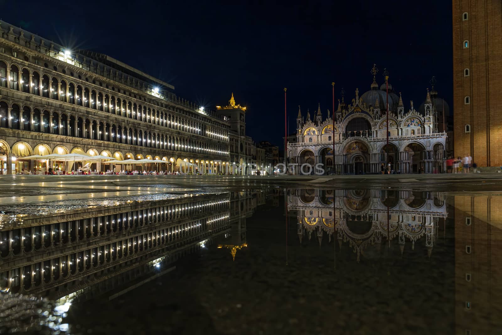 Piazza San Marco at night with reflection of the Basilica