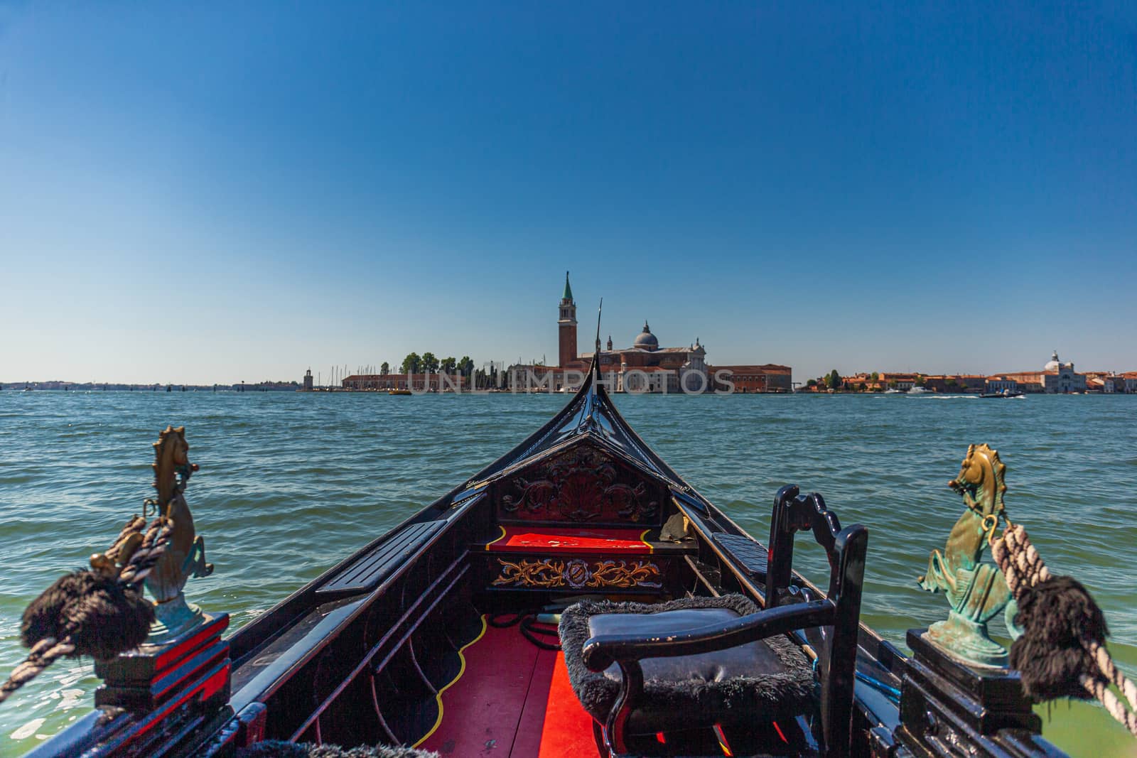 Point of view in an gondola boat with San Giorgio Maggiore in the background by COffe