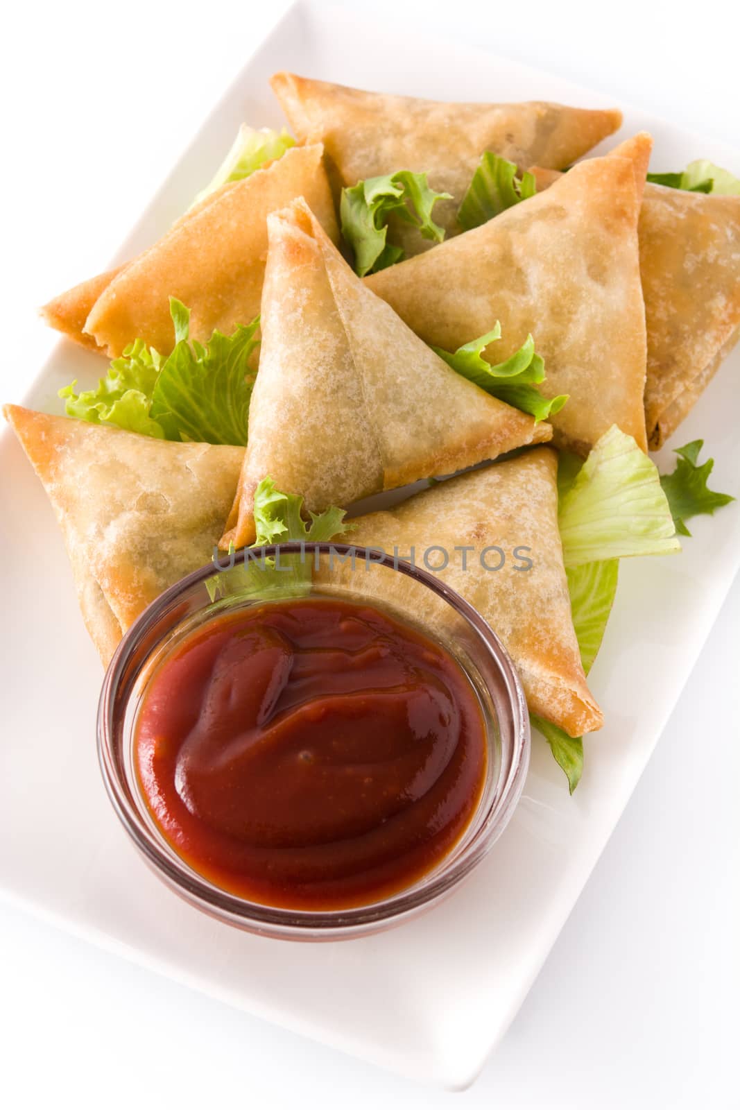 Samsa or samosas with meat and vegetables isolated on white background. Traditional Indian food. by chandlervid85