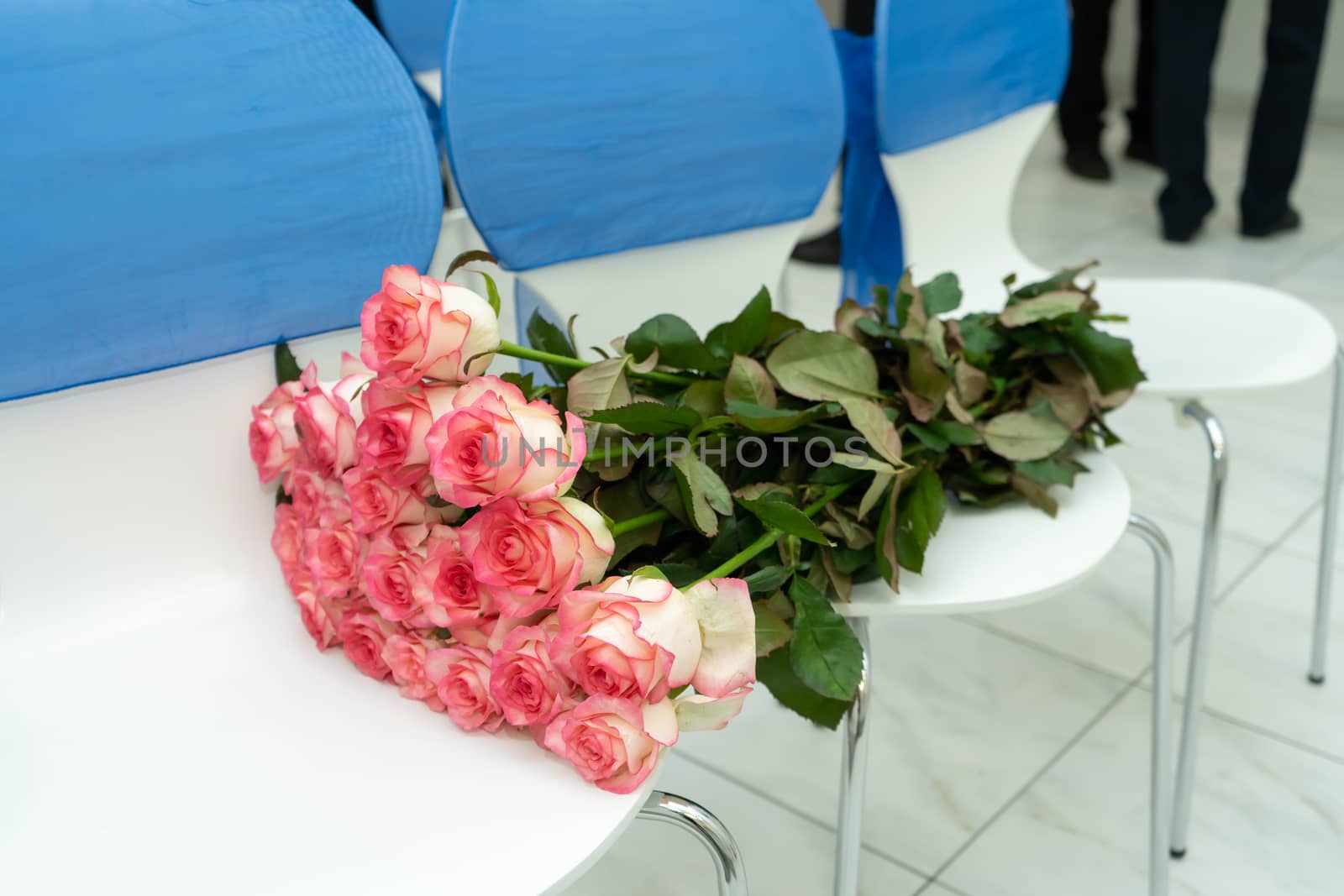 Bouquet of fresh flowers from pink-white roses.