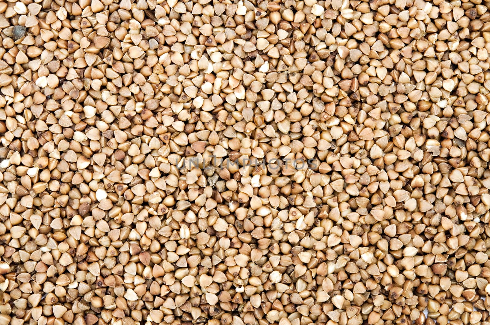 cleaned buckwheat stacked as background