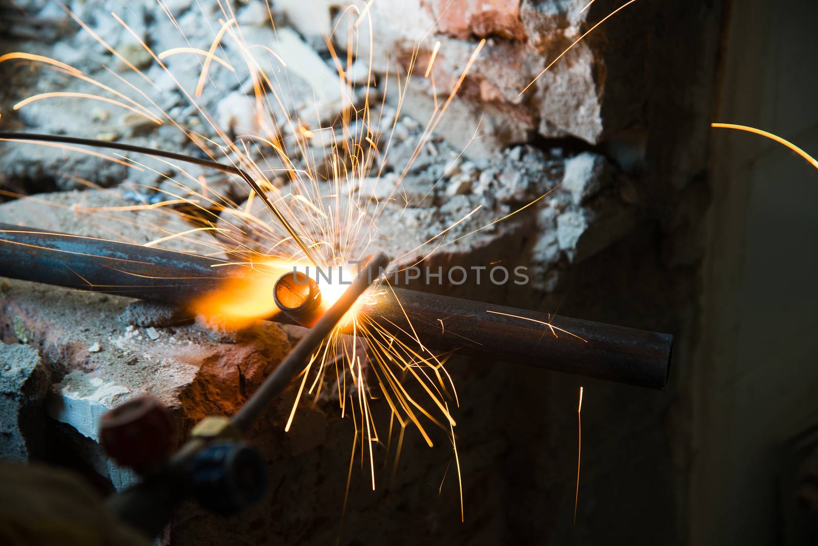 Welders working at the factory made metal by grigorenko