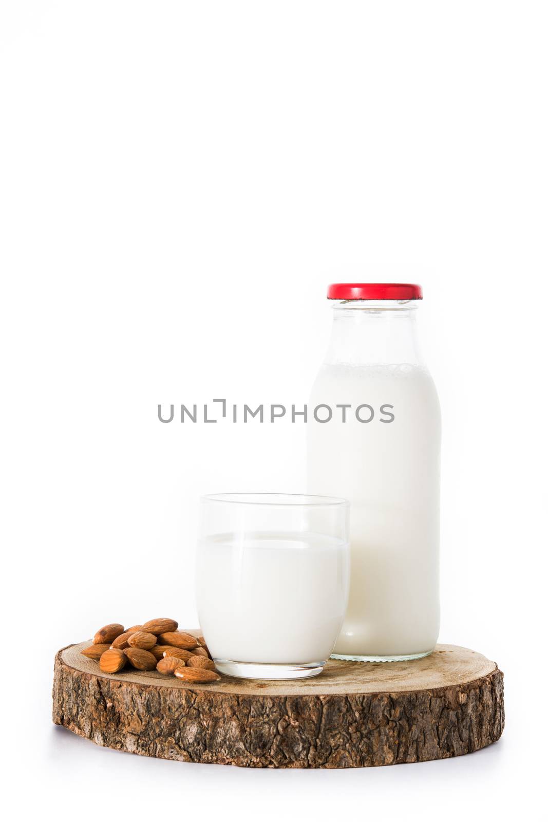 Almond milk isolated on white background.