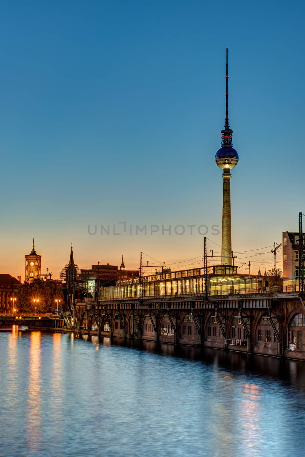 Sunset at the river Spree in Berlin with the TV Tower