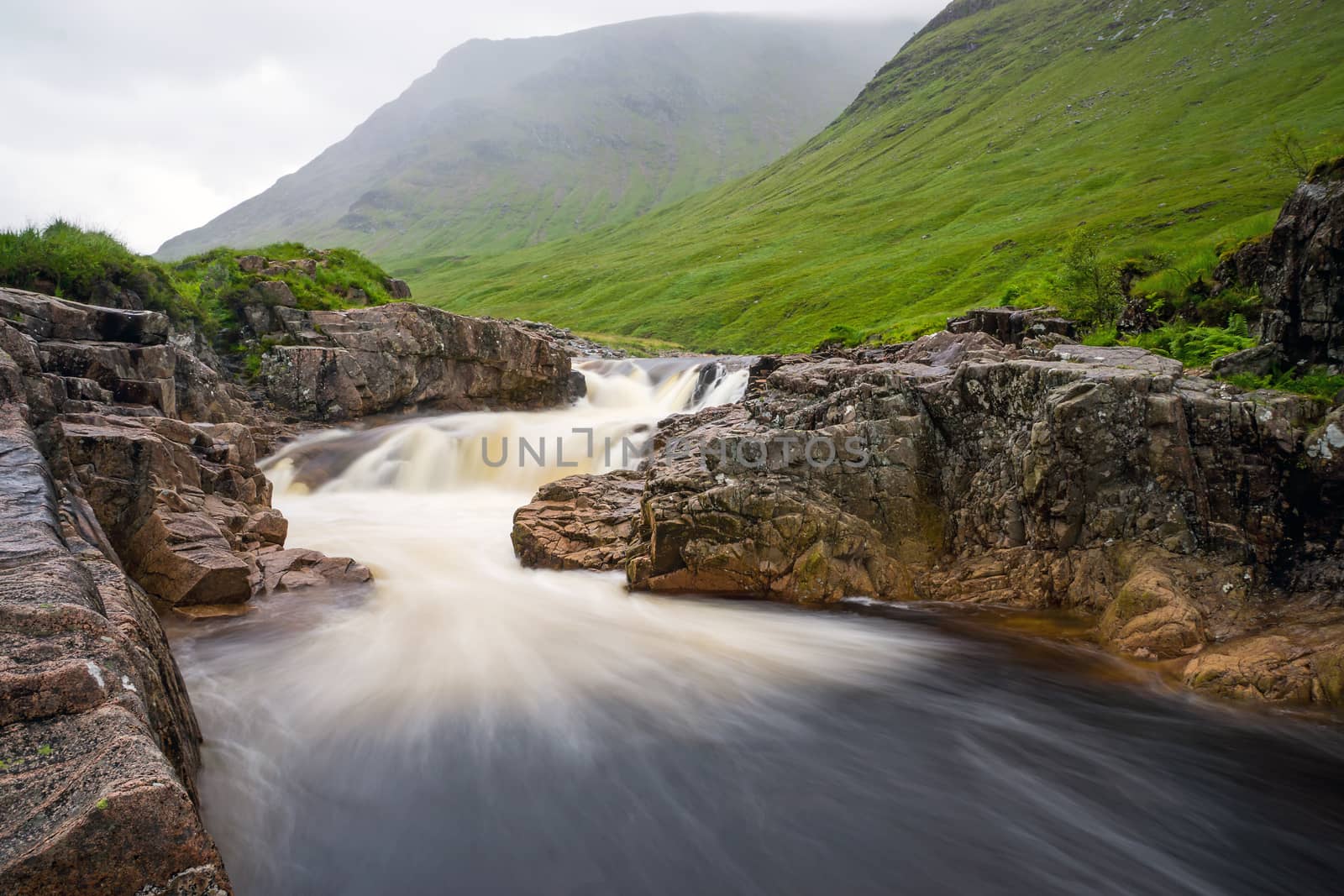The river Etive in Glen Coe, Scotland, on a rainy day